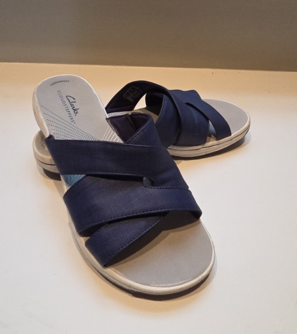 Clarks navy crisscross slip-on sandals